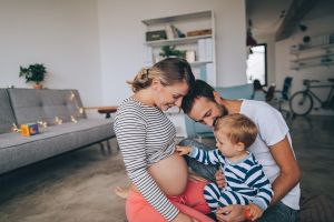 Pregnant woman with family