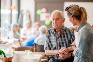 Older man with carer