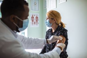 Woman getting vaccine